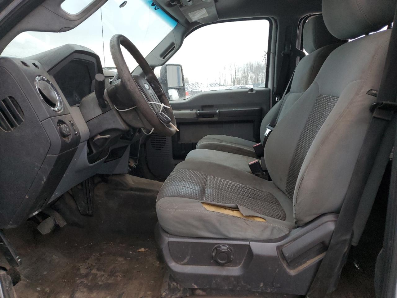 2014 Ford F250 Super Duty White vin: 1FT7W2B65EEA18448 Damage: Left Front Seat, Torn, > 12 Inches