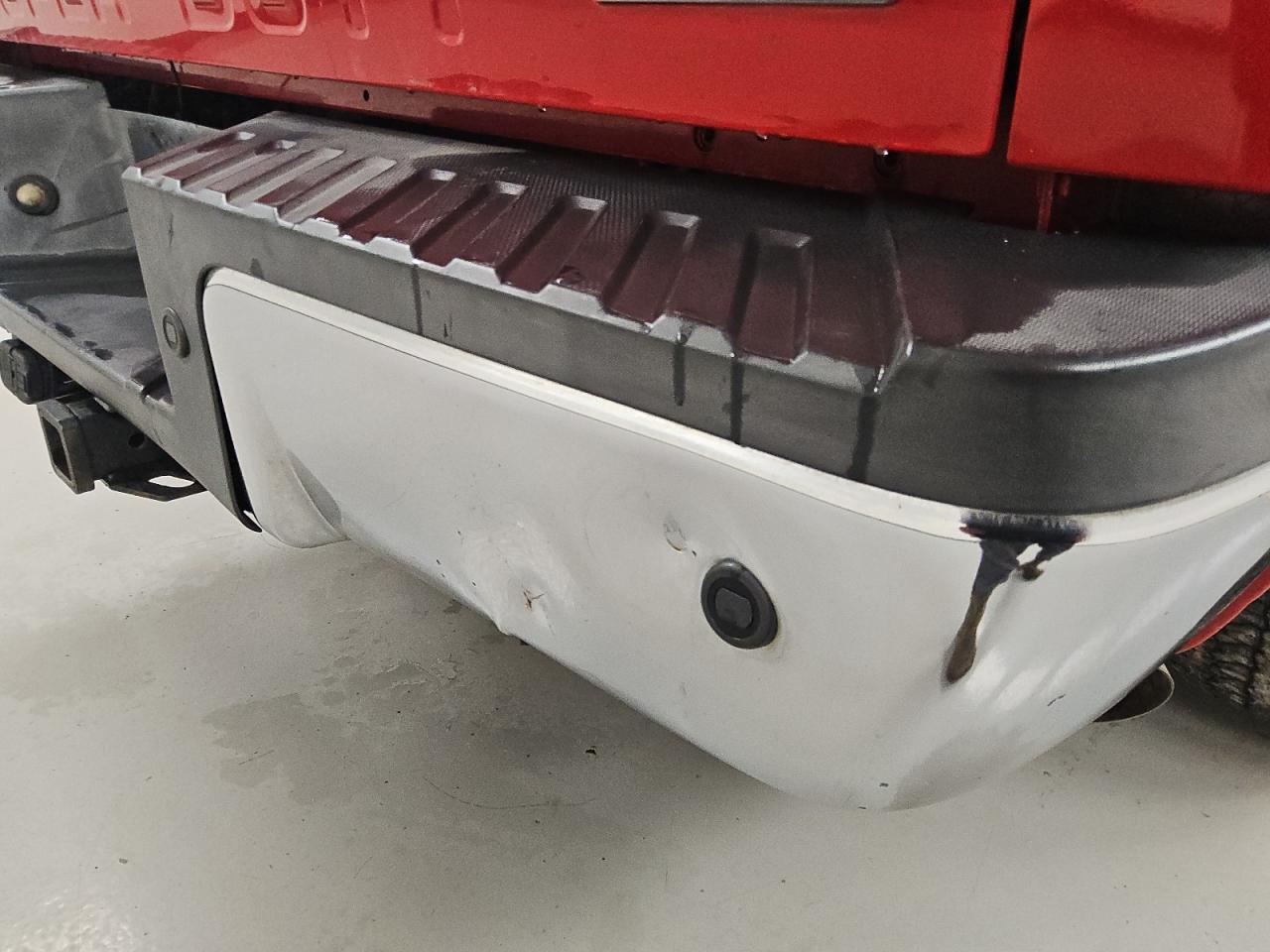 2015 Ford F250 Super Duty Red vin: 1FT7W2B67FEB78493 Damage: Rear Metal Bumper Chrome, Dent(S) W/No Paint Dmg, 9 To 10 Inches