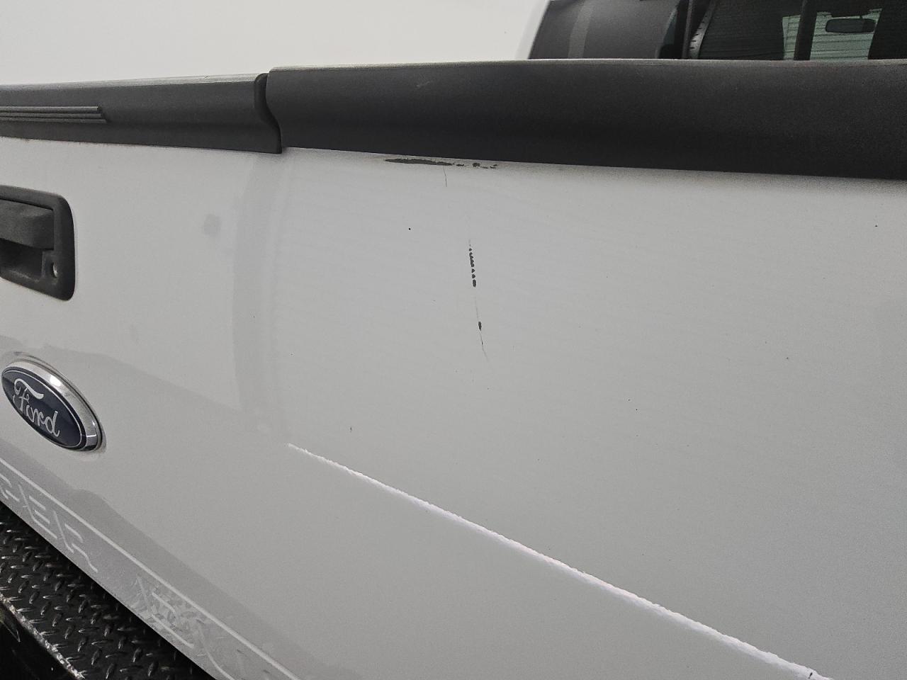 2012 Ford F250 Super Duty White vin: 1FT7W2BT7CEC18105 Damage: Tailgate, Heavy Scratch, > 12 Inches