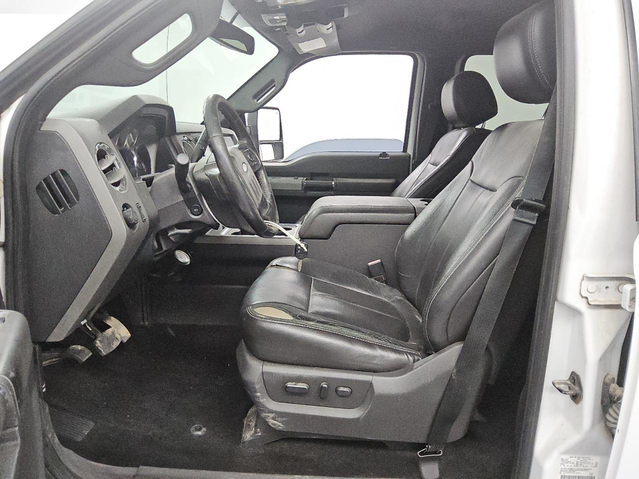 2012 Ford F250 Super Duty White vin: 1FT7W2BT7CEC18105 Damage: Left Front Seat Cushion, Torn, 7 To 8 Inches