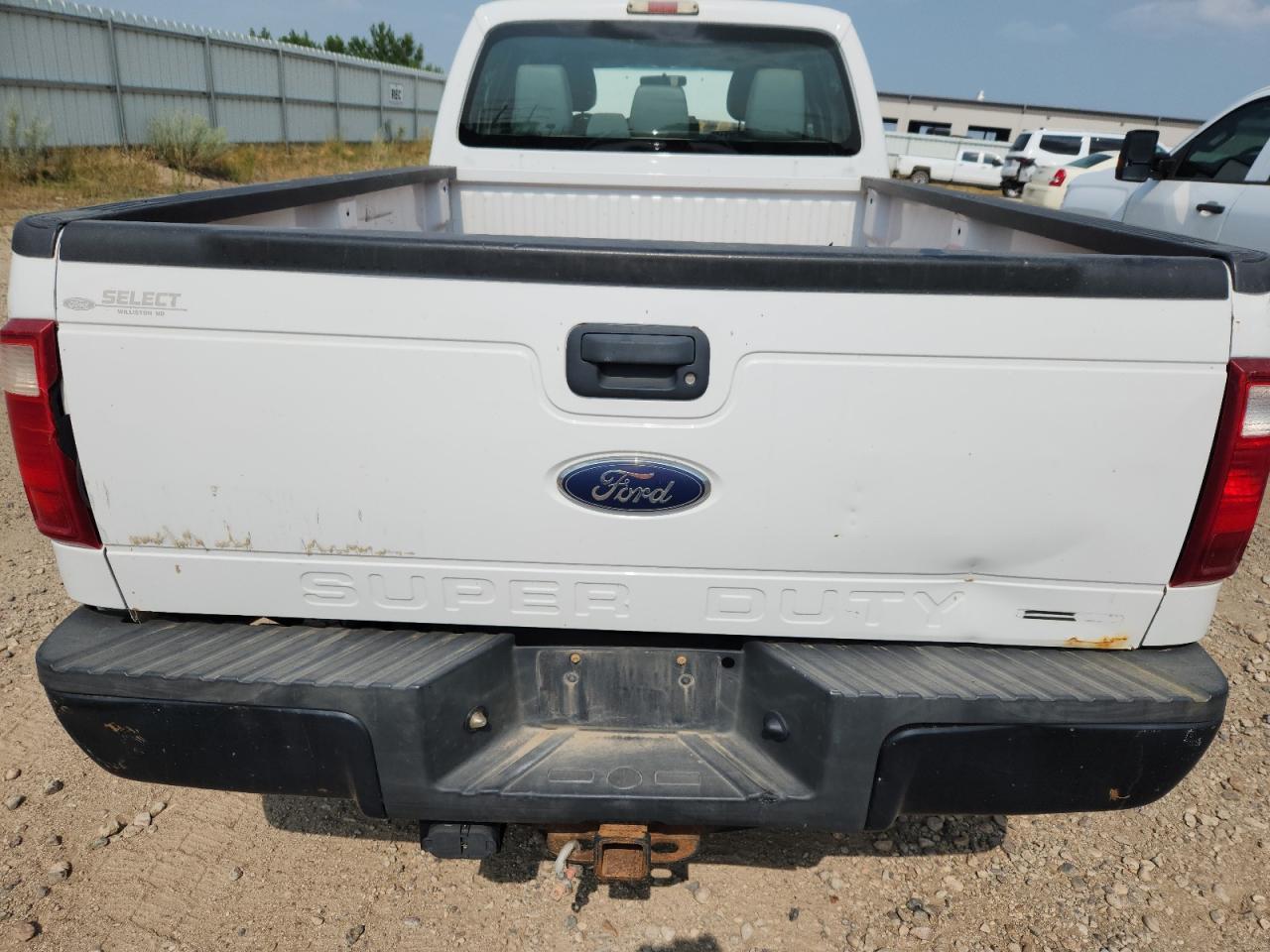 2012 Ford F250 Super Duty White vin: 1FT7W2BT9CEA51049 Damage: Tailgate, Rust, 2 To 3 Inches