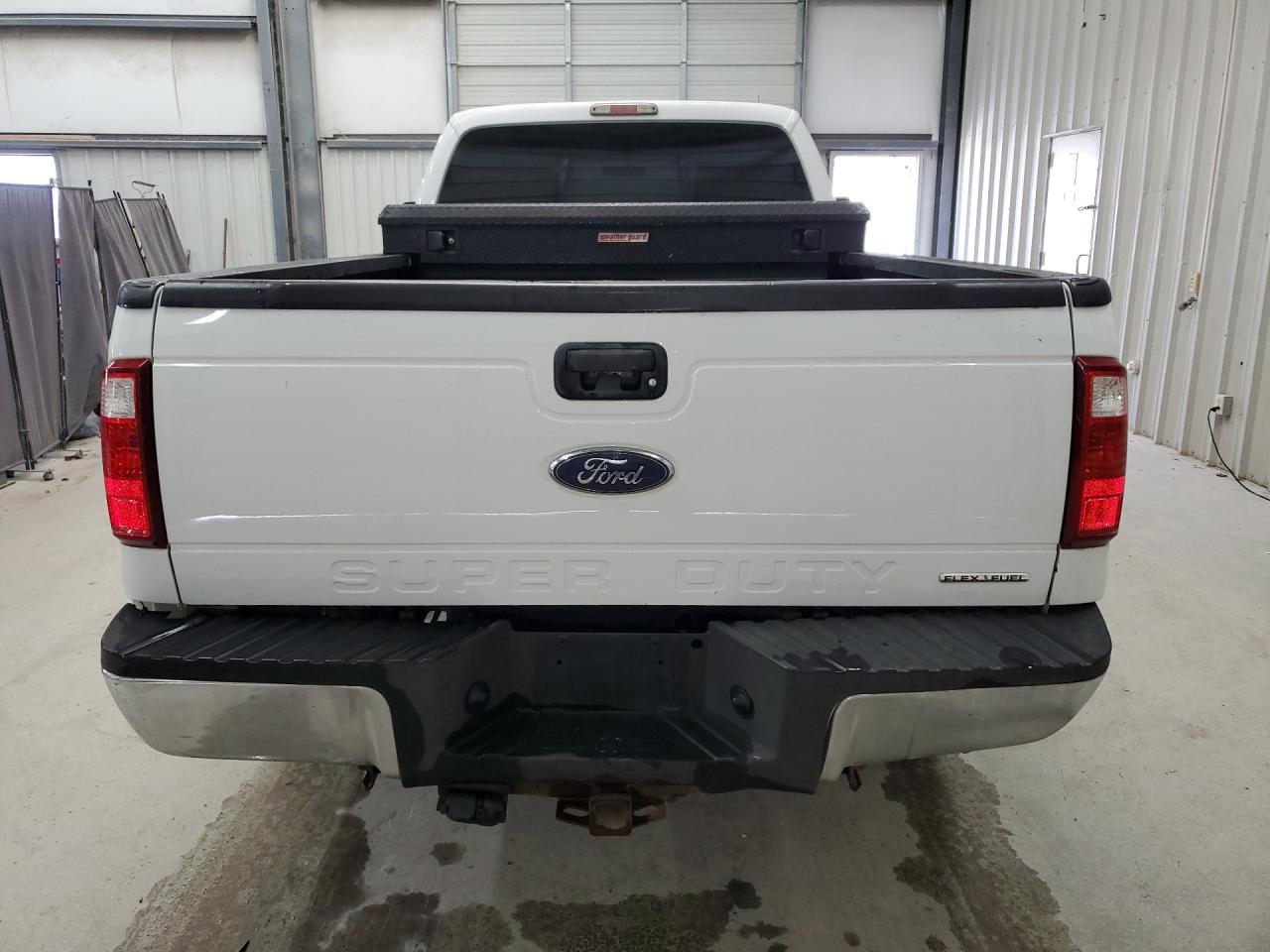2015 Ford F250 Super Duty White vin: 1FT7X2B64FEB88962 Damage: Rear Metal Bumper Chrome, Multiple Dents/No Paint Damage, 2