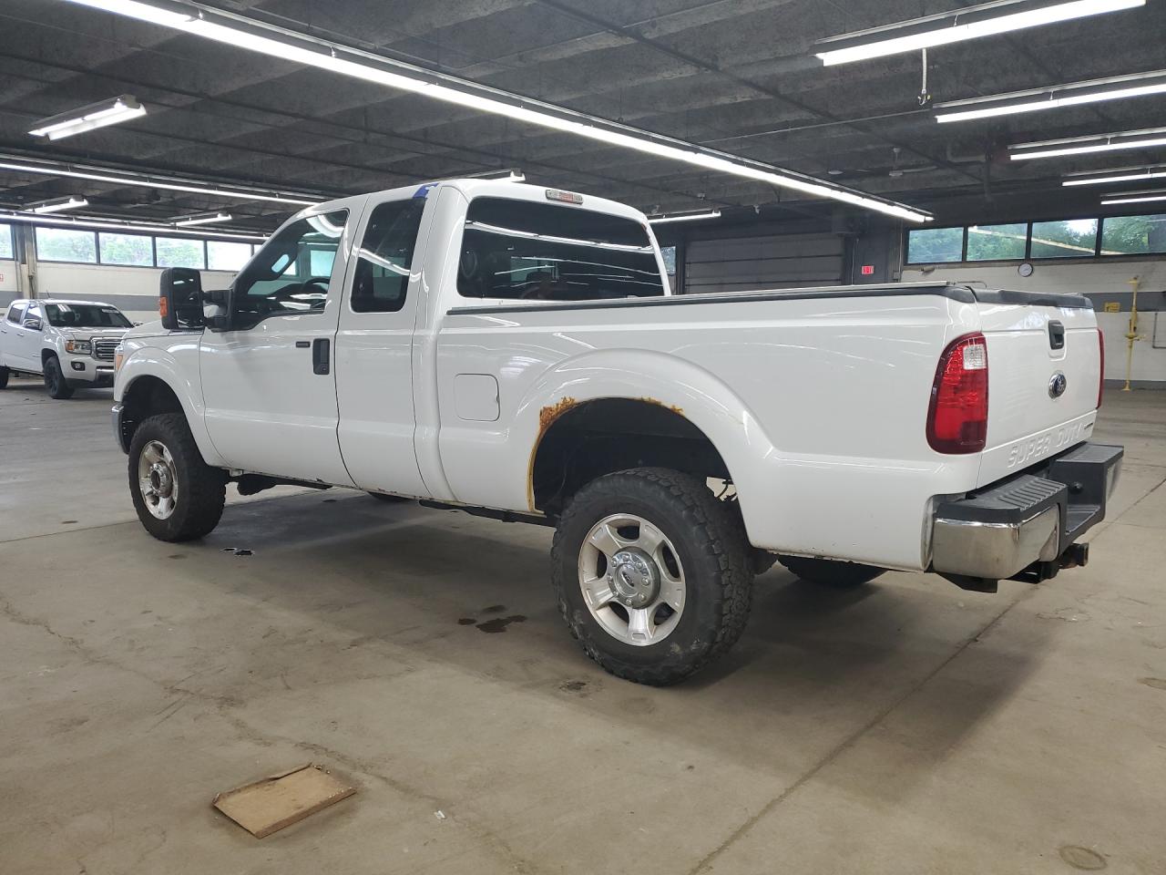 2016 Ford F250 Super Duty White vin: 1FT7X2B64GEB92303 Damage: Left Rear Door, Rust, 2 To 3 Inches