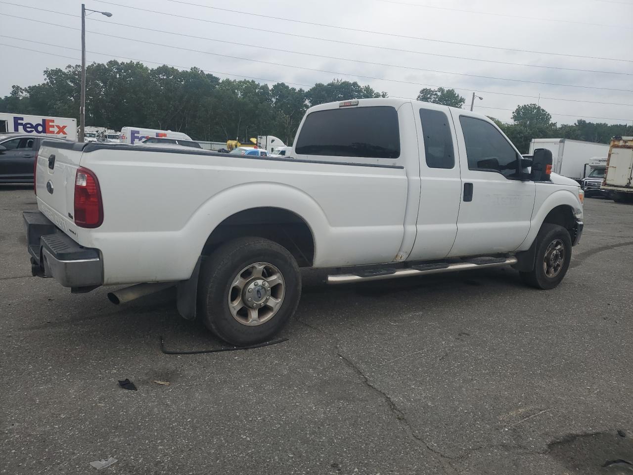 2014 Ford F250 Super Duty White vin: 1FT7X2B6XEEA34464 Damage: Right Cab Side, Dent(S) W/ Paint Dmg, 1/2 To 1 Inch