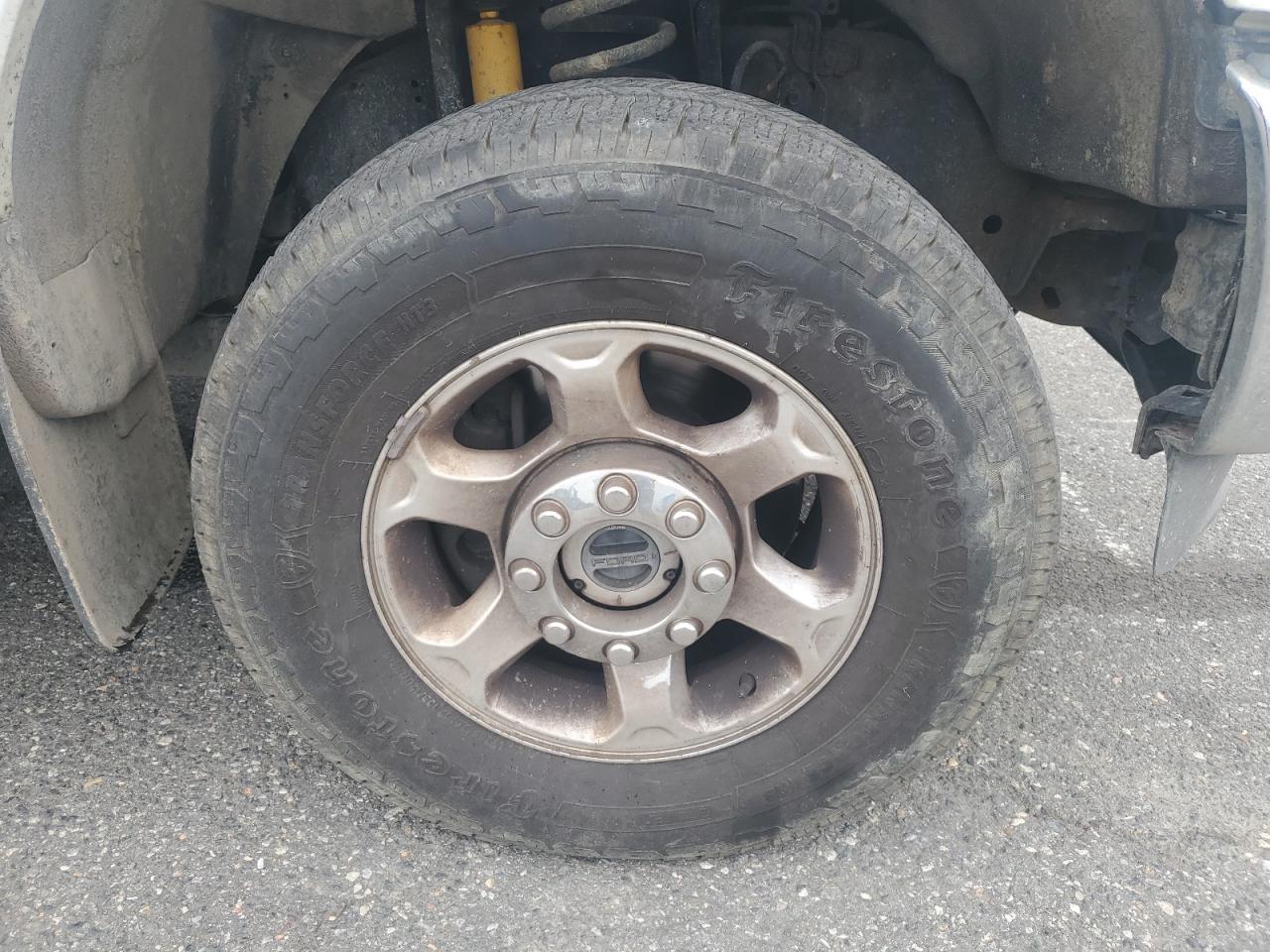 2014 Ford F250 Super Duty White vin: 1FT7X2B6XEEA34464 Damage: Right Front Wheel, Curb Rash, 1/2 To 1 Inch