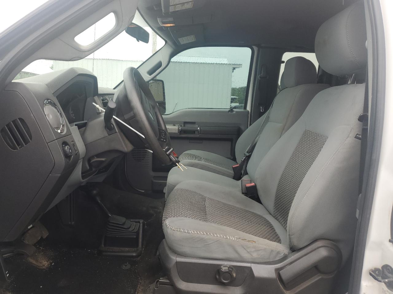 2014 Ford F250 Super Duty White vin: 1FT7X2B6XEEA34464 Damage: Left Front Seat Cushion, Torn, 2 To 3 Inches
