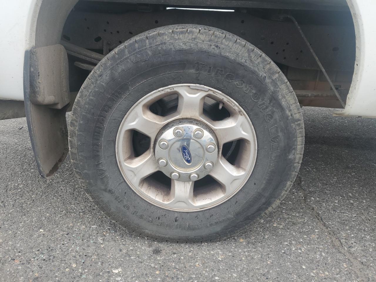 2014 Ford F250 Super Duty White vin: 1FT7X2B6XEEA34464 Damage: Right Rear Wheel, Curb Rash, 4 To 5 Inches