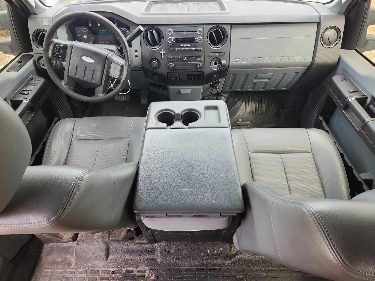 2012 Ford F350 Super Duty White vin: 1FT8W3BT1CEC67701 Damage: Left Front Seat Cushion, Cut, 1 To 2 Inches