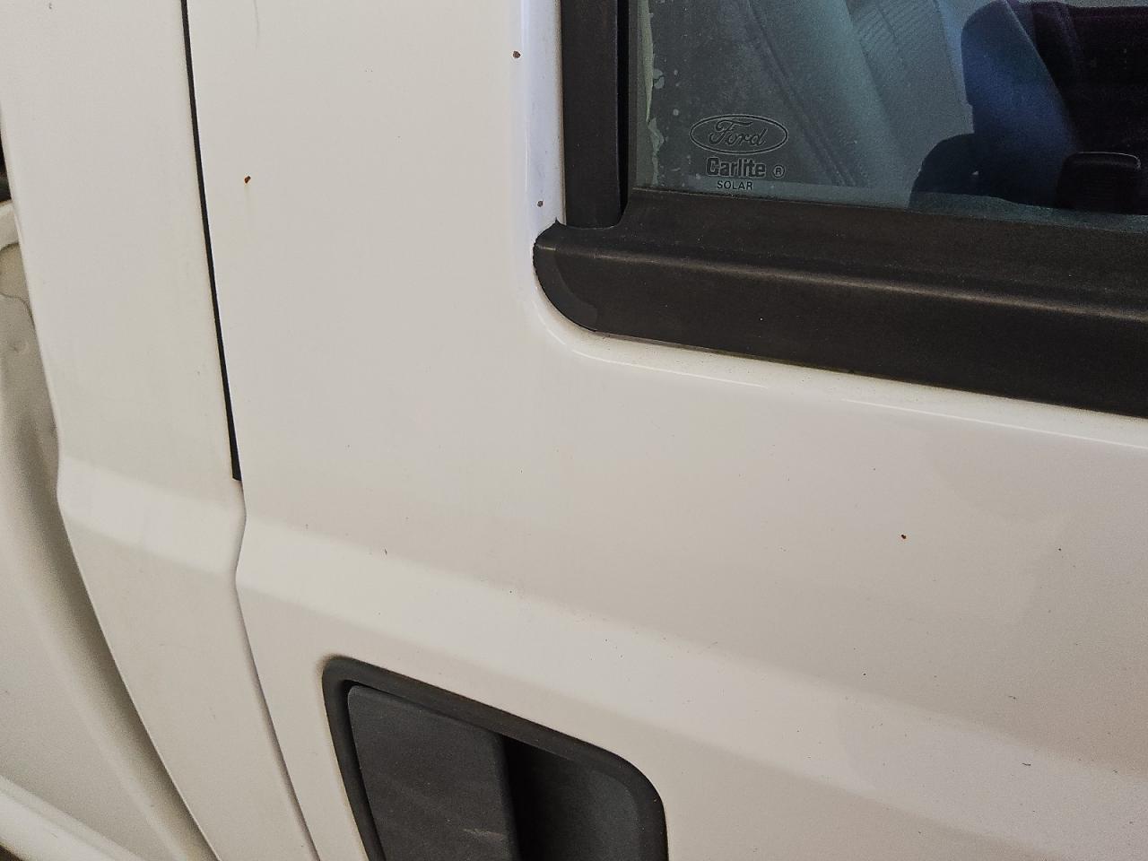 2015 Ford F250 Super Duty White vin: 1FTBF2A62FEA07369 Damage: Right Rear Door, Heavy Scratch, 1/2 To 1 Inch