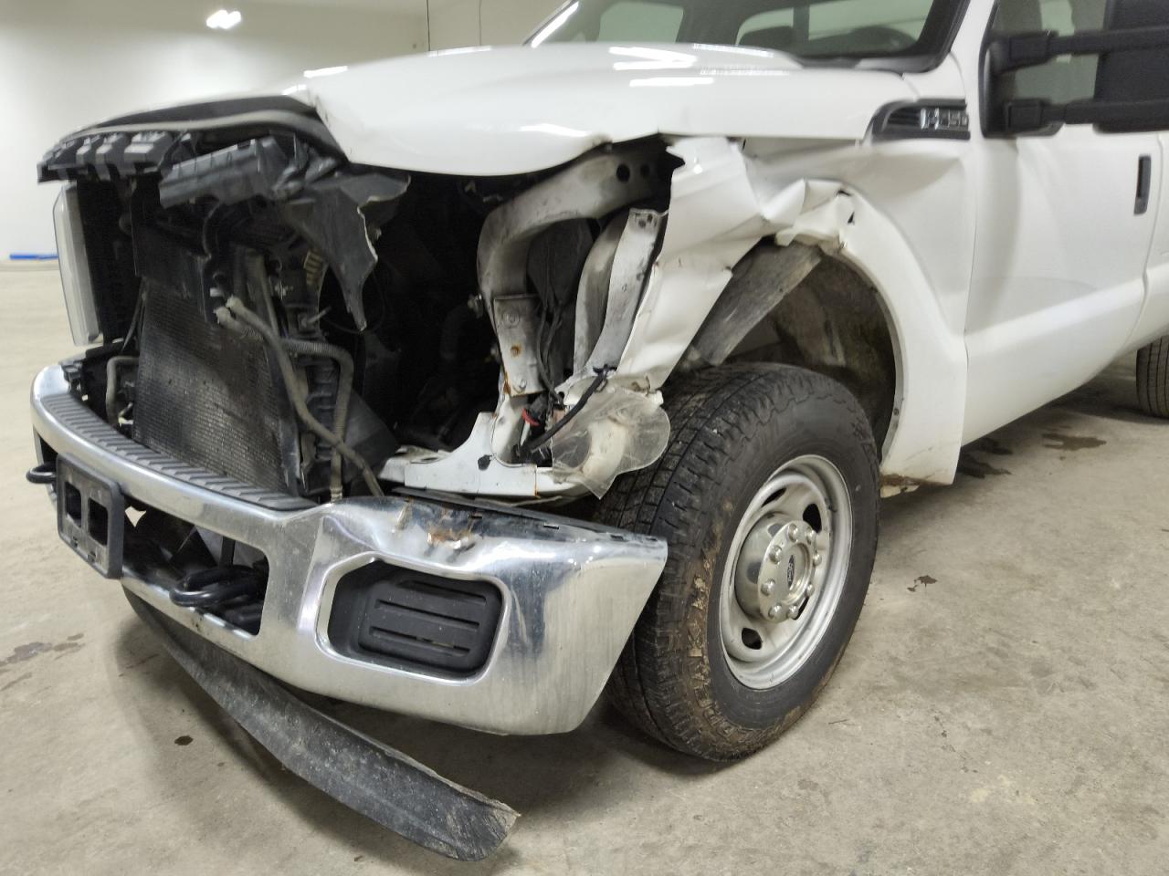 2015 Ford F250 Super Duty White vin: 1FTBF2A6XFEB63790 Damage: Left Head Lamp, Broken, Replacement Required