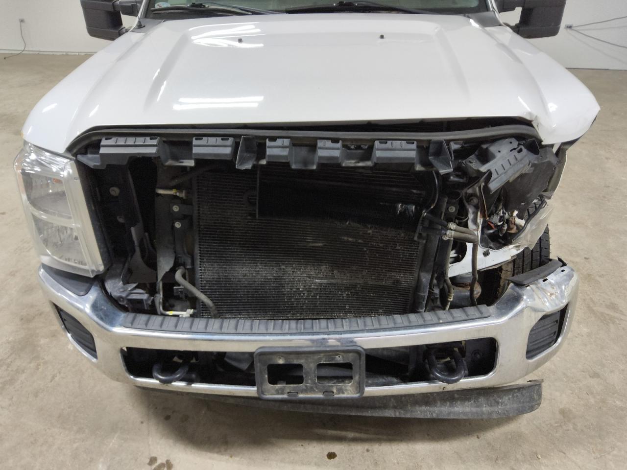 2015 Ford F250 Super Duty White vin: 1FTBF2A6XFEB63790 Damage: Grille, Missing, Replacement Required