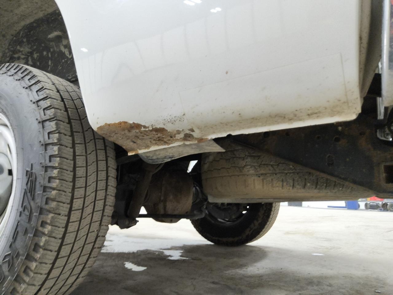 2015 Ford F250 Super Duty White vin: 1FTBF2A6XFEB63790 Damage: Left Bed Side, Rust, > 12 Inches
