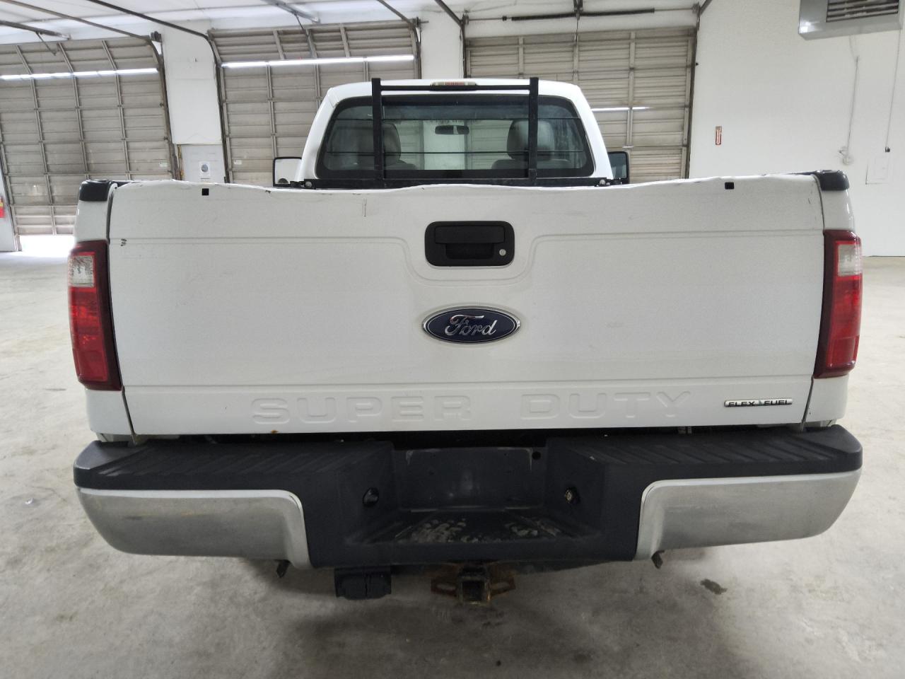 2015 Ford F250 Super Duty White vin: 1FTBF2A6XFEB63790 Damage: Tailgate, Dent(S) W/ Paint Dmg, > 12 Inches