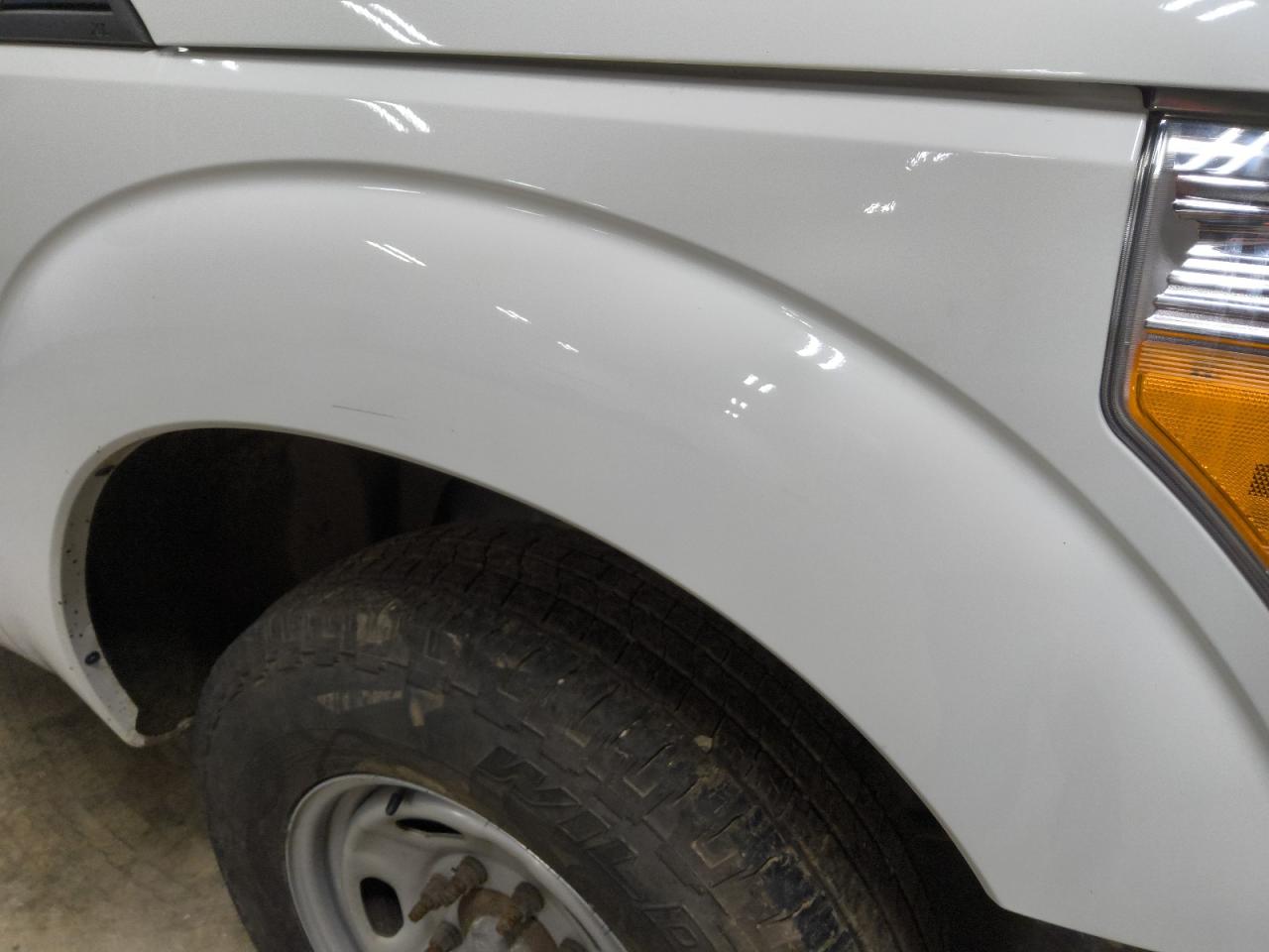 2015 Ford F250 Super Duty White vin: 1FTBF2A6XFEB63790 Damage: Right Front Fender, Multiple Scratches Heavy, 3