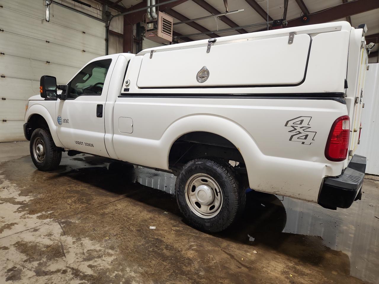 2013 Ford F250 Super Duty White vin: 1FTBF2B65DEB31082 Damage: Left Bed Side, Dent(S) W/ Paint Dmg, 5 To 6 Inches