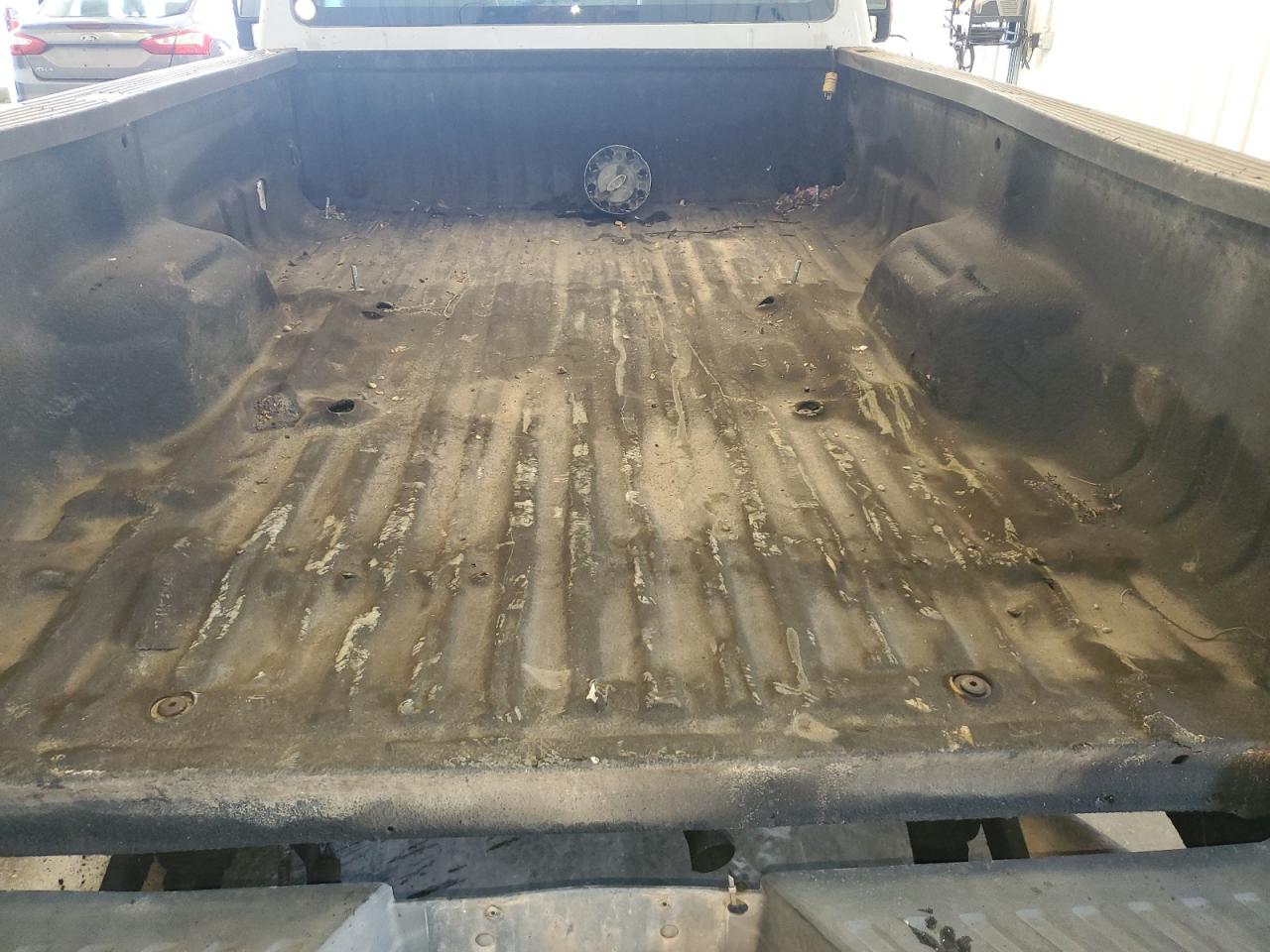2011 Ford F250 Super Duty White vin: 1FTBF2B67BEC37529 Damage: Inside Bed, Hole(S), 4 To 5 Inches