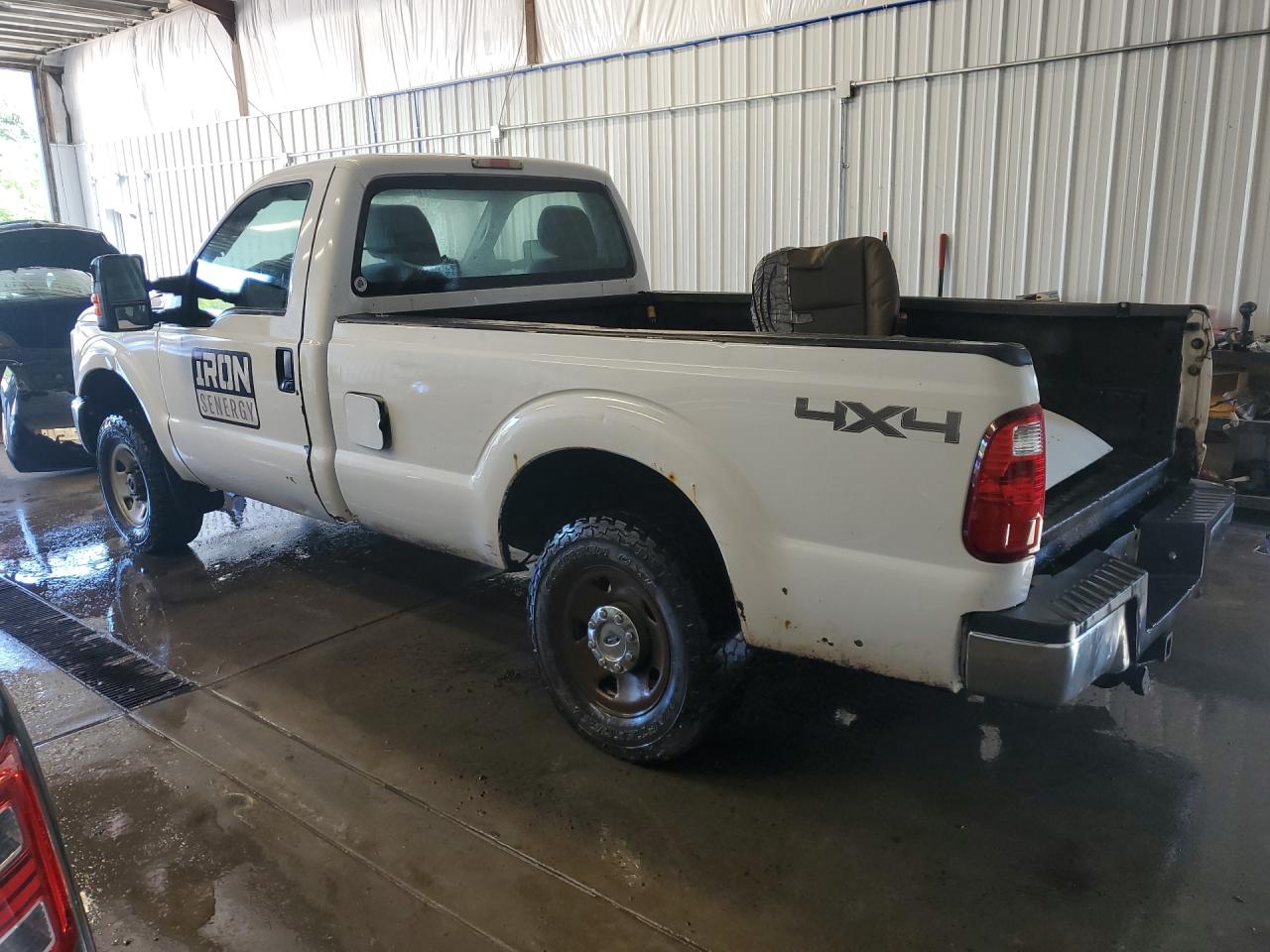 2011 Ford F250 Super Duty White vin: 1FTBF2B67BEC37529 Damage: Left Rear Tire, Worn, Replacement Required
