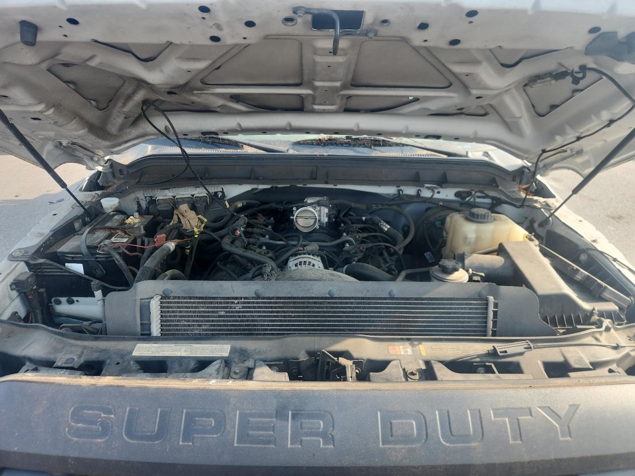 2015 Ford F350 Super Duty White vin: 1FTBF3A67FEC59270 Damage: Air Intake Duct, Missing, Replacement Required