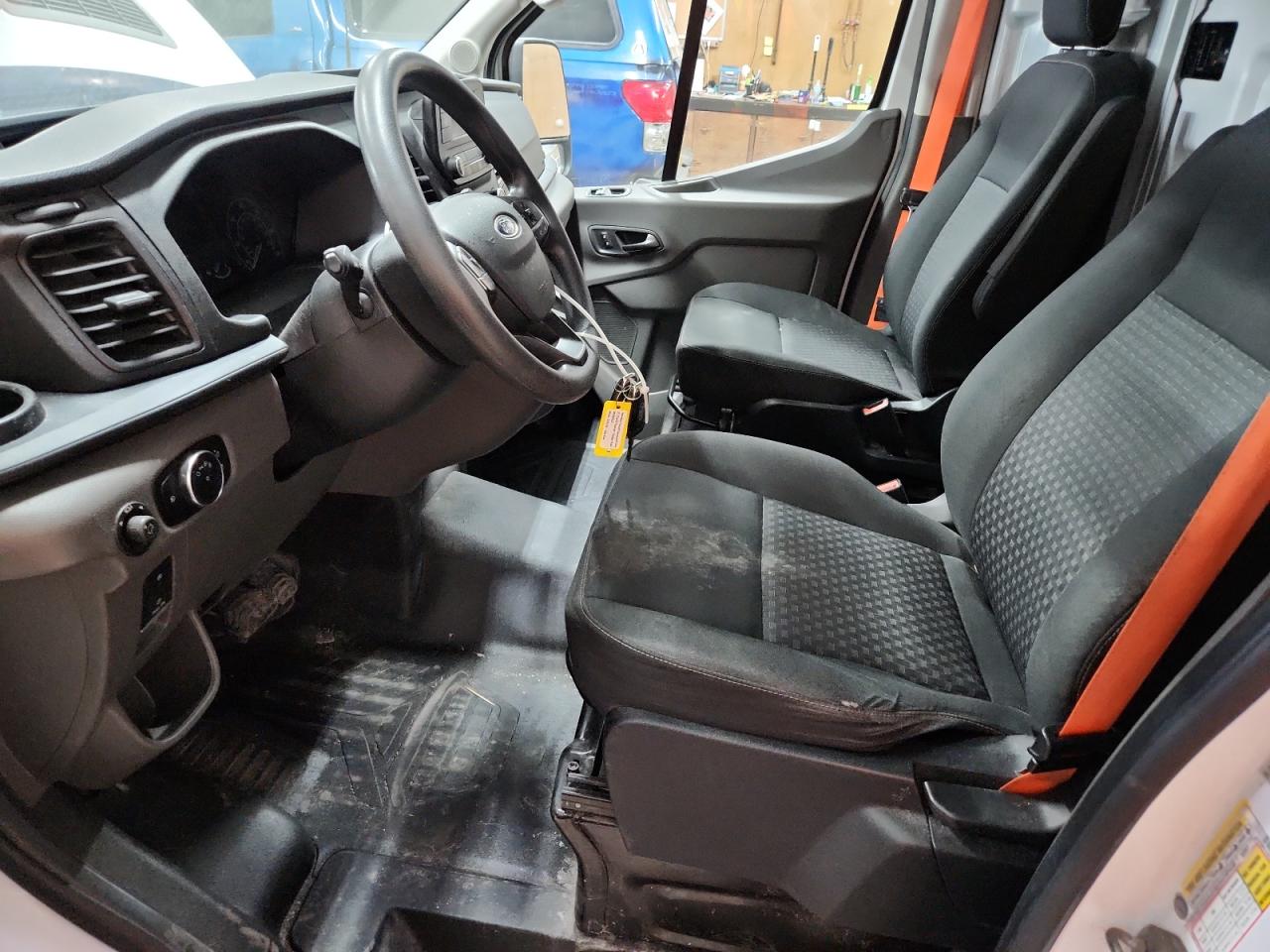 2021 Ford Transit T-250 White vin: 1FTBR1C83MKA86226 Damage: Left Front Seat Cushion, Worn, Replacement Required