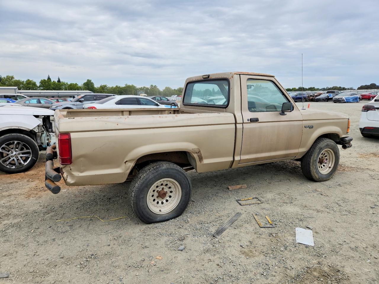 1989 Ford Ranger Gold vin: 1FTCR11A1KUB06081