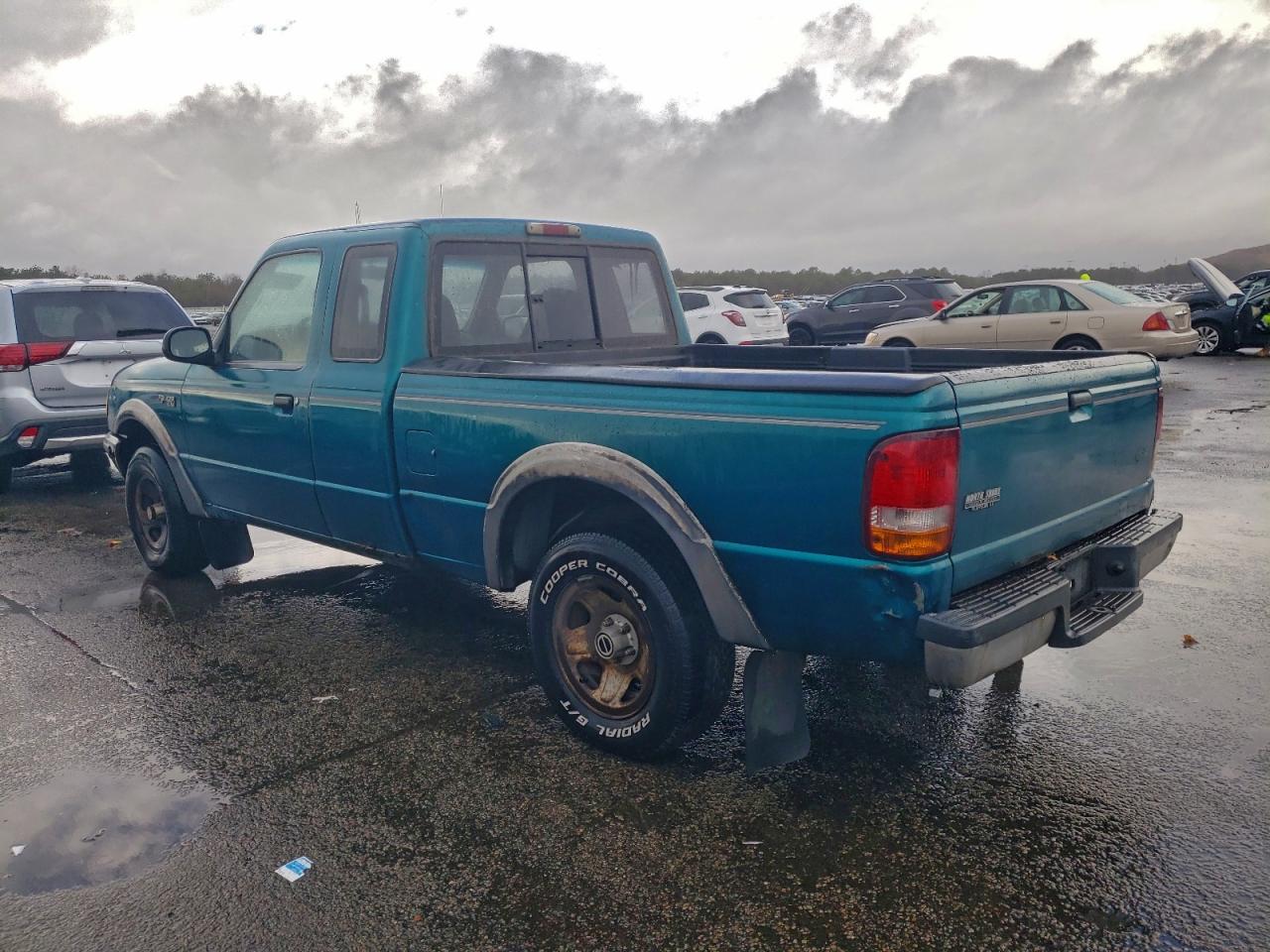 1993 Ford Ranger Super Cab Teal vin: 1FTCR15X4PTA69605