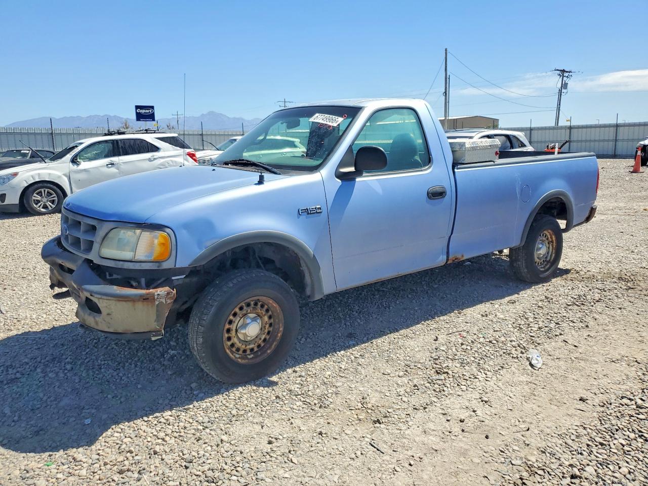 1997 Ford F150 Blue vin: 1FTDF18W8VKC61869