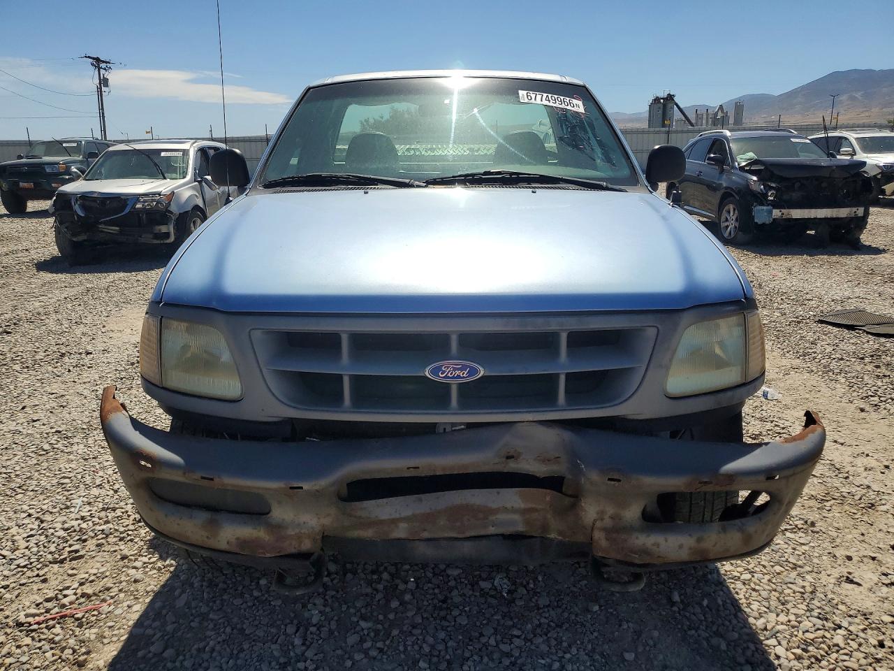 1997 Ford F150 Blue vin: 1FTDF18W8VKC61869