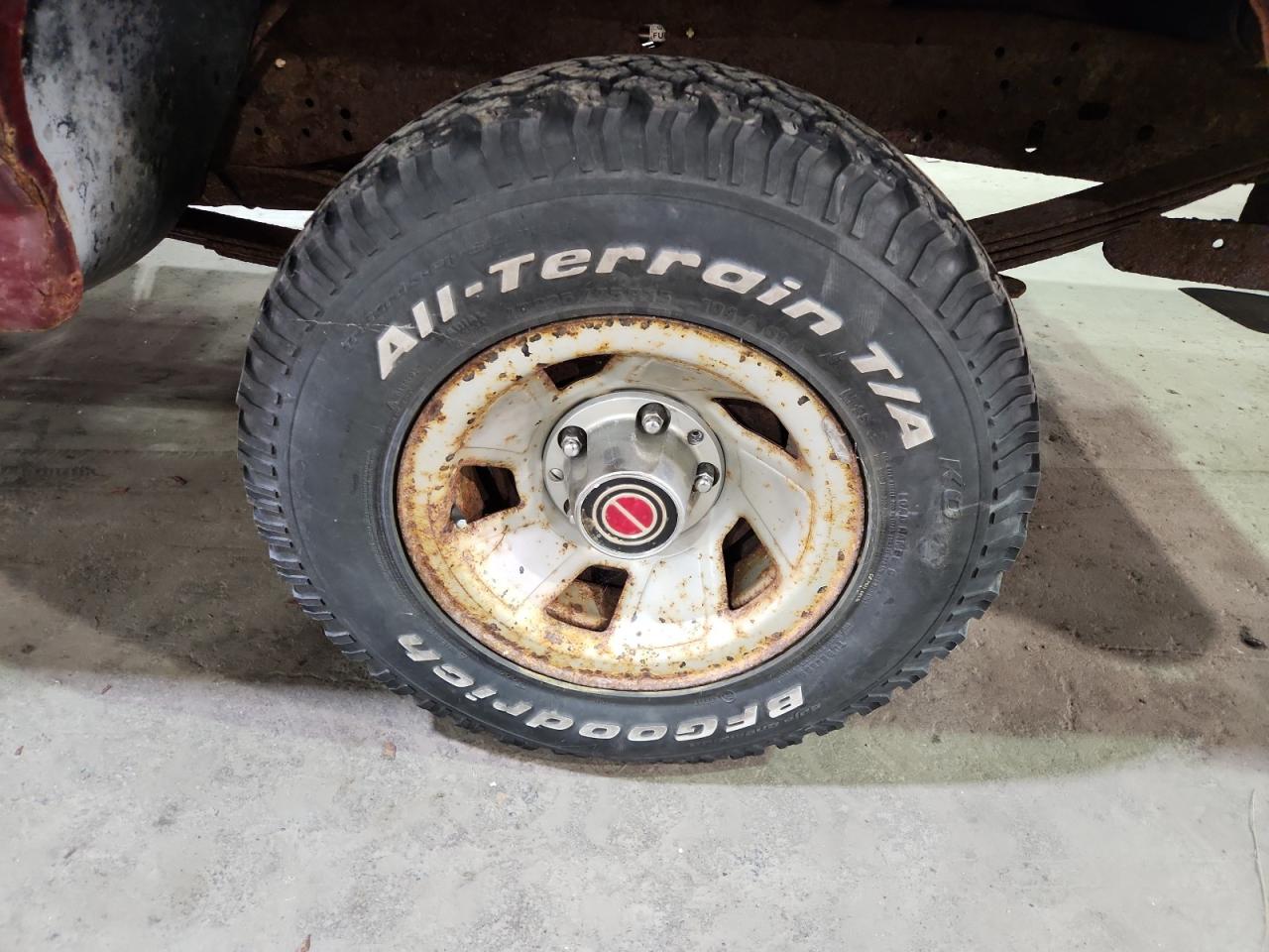 1993 Ford F150 Red vin: 1FTEF15NXPLA62030 Damage: Left Rear Wheel, Rust, Repair Required