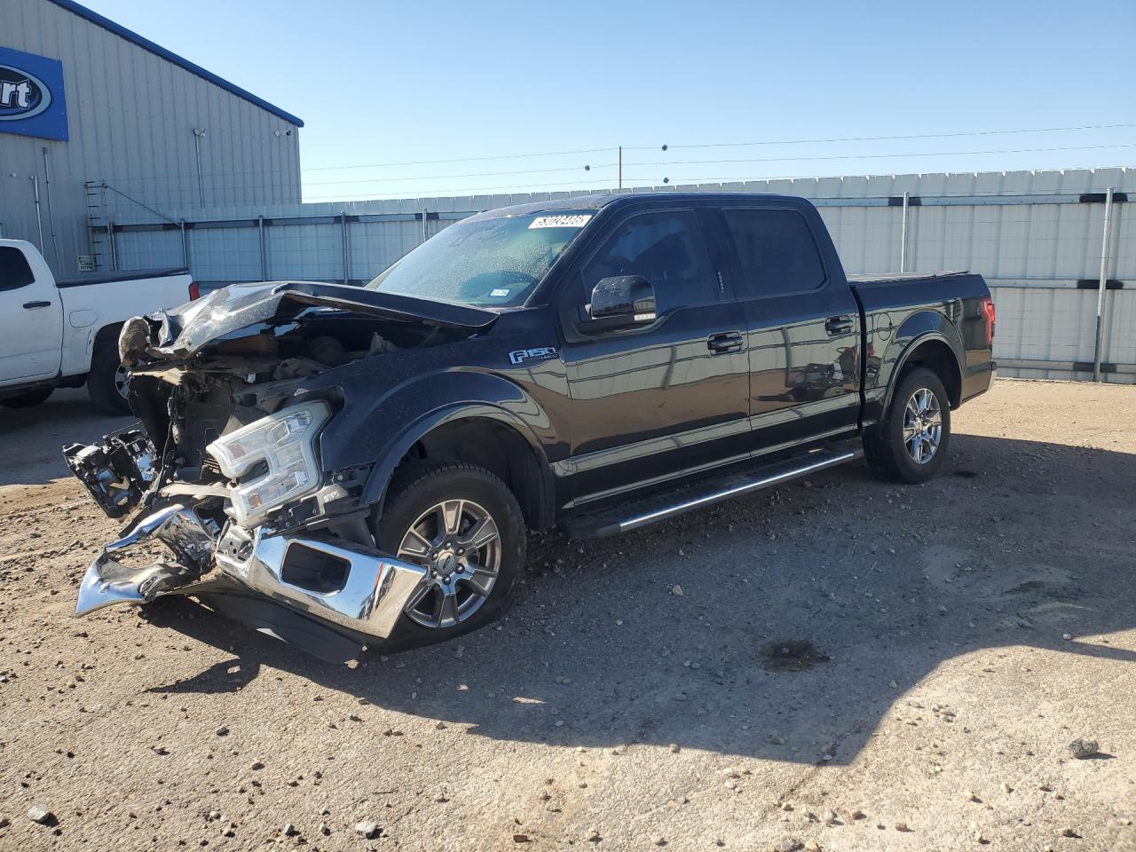 2015 Ford F150 Supercrew Black vin: 1FTEW1CF4FKE08637 Damage: Left Front Fender, Dent(S) W/No Paint Dmg, 1 To 2 Inches