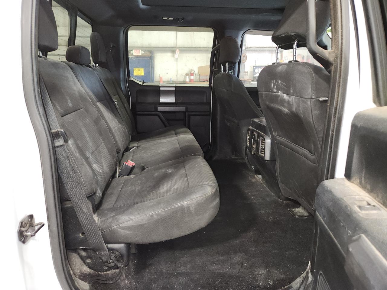 2015 Ford F150 Supercrew White vin: 1FTEW1CF5FFC98500 Damage: Right Rear Seat, Stained, Permanent