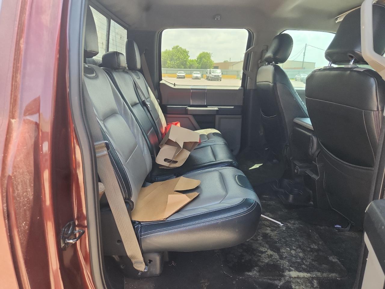 2015 Ford F150 Supercrew Burgundy vin: 1FTEW1CG8FKF15313 Damage: Right Rear Carpet, Stained, Permanent