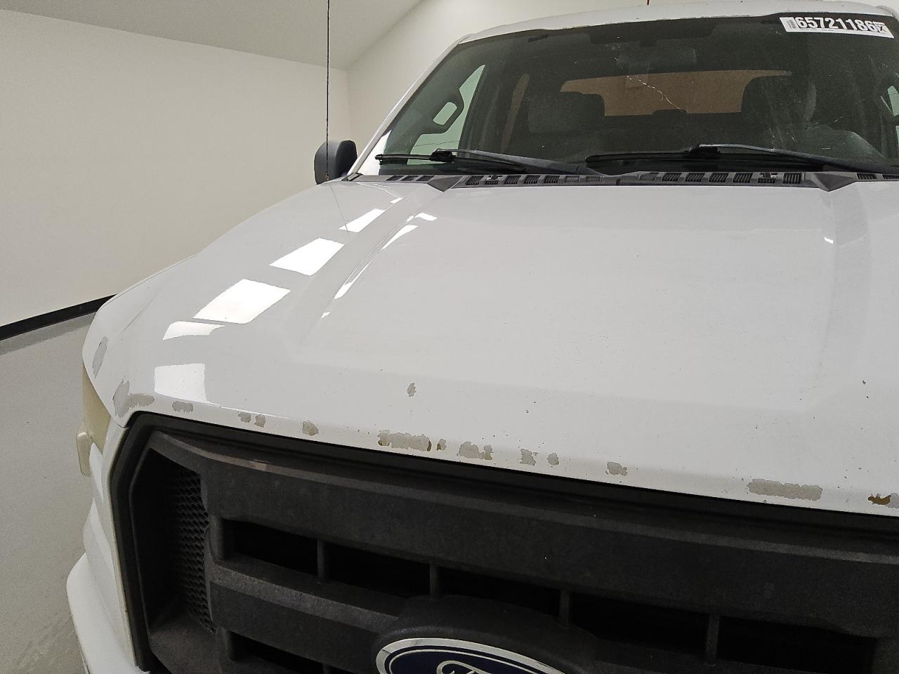 2015 Ford F150 Supercrew White vin: 1FTEW1CP6FKD55707 Damage: Hood, Peeling, > 12 Inches
