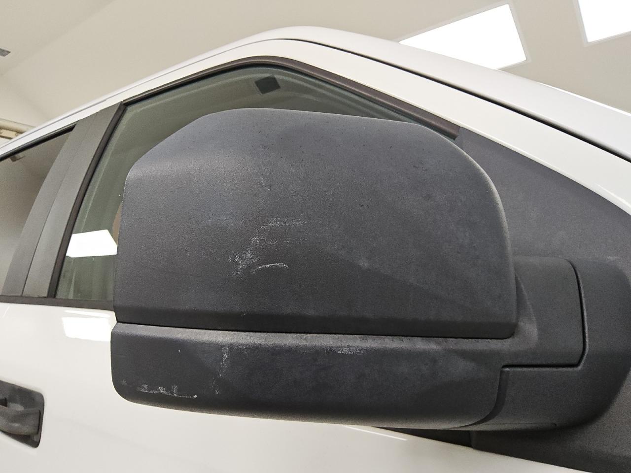 2015 Ford F150 Supercrew White vin: 1FTEW1CP6FKD55707 Damage: Right Mirror, Heavy Scratch, 1 To 2 Inches
