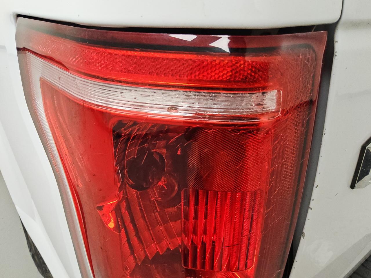 2015 Ford F150 Supercrew White vin: 1FTEW1CP6FKD55707 Damage: Left Tail Light, Broken, Replacement Required