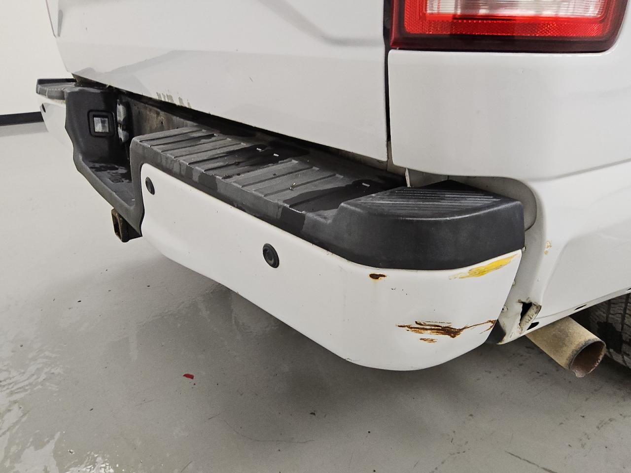 2015 Ford F150 Supercrew White vin: 1FTEW1CP6FKD55707 Damage: Rear Metal Bumper Painted, Rust, 5 To 6 Inches