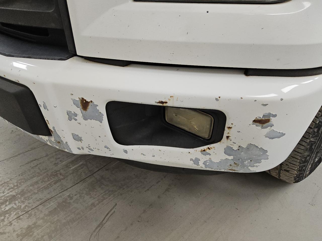 2015 Ford F150 Supercrew White vin: 1FTEW1CP6FKD55707 Damage: Front Metal Bumper Painted, Rust, > 12 Inches