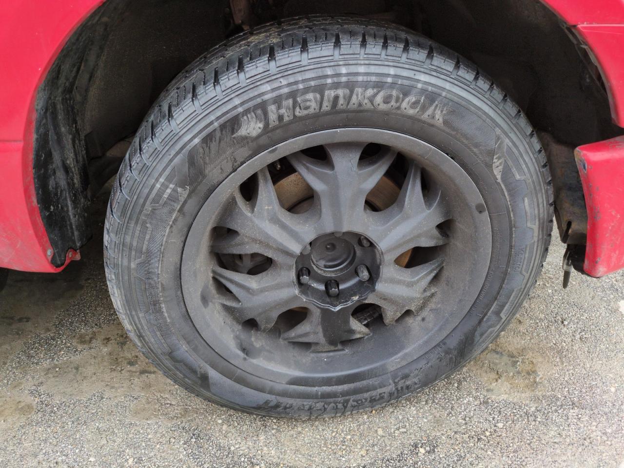 2015 Ford F150 Supercrew Red vin: 1FTEW1CP9FFC68781 Damage: Right Front Center Cap, Missing, Replacement Required