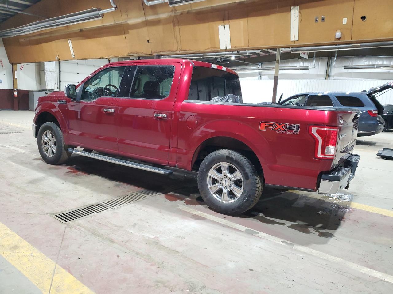 2015 Ford F150 Supercrew Red vin: 1FTEW1EF1FFA22800 Damage: Left Bed Side, Dent(S) W/No Paint Dmg, 1/2 To 1 Inch