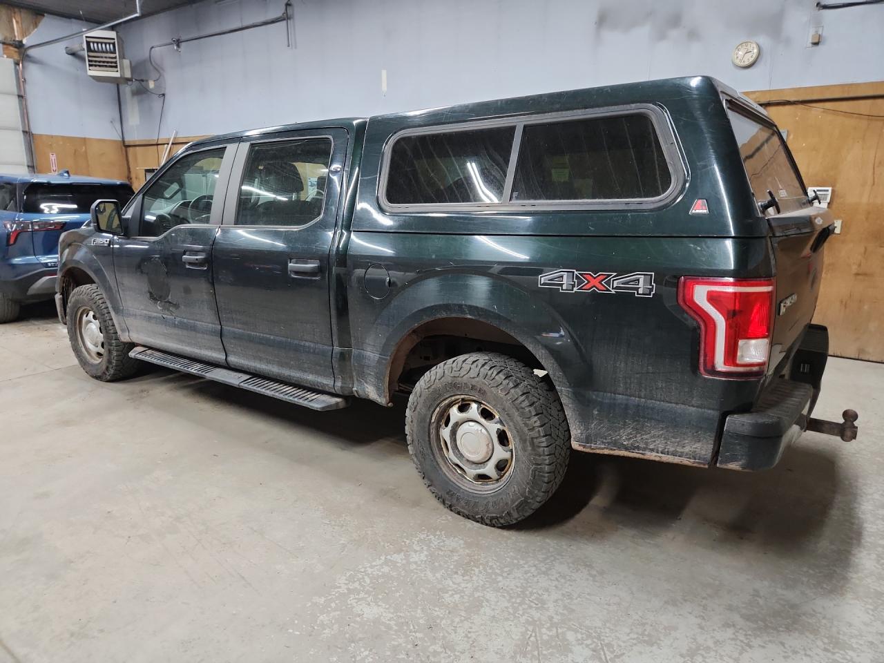 2015 Ford F150 Supercrew Green vin: 1FTEW1EF2FFA75988 Damage: Left Tail Light, Broken, Replacement Required