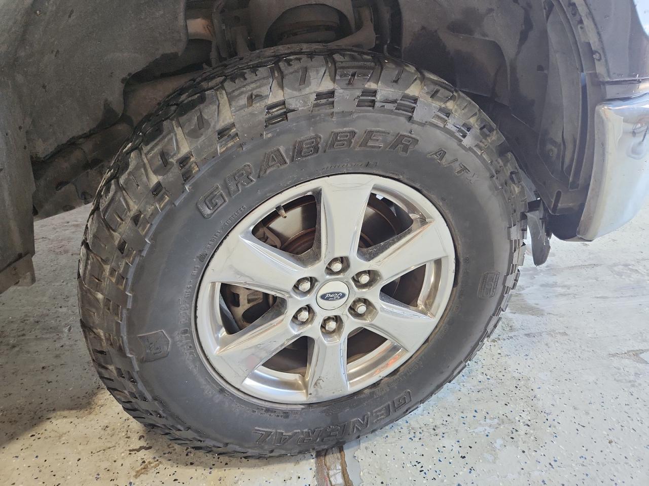 2015 Ford F150 Supercrew Black vin: 1FTEW1EF8FKE73021 Damage: Right Front Wheel, Curb Rash, 11 To 12 Inches
