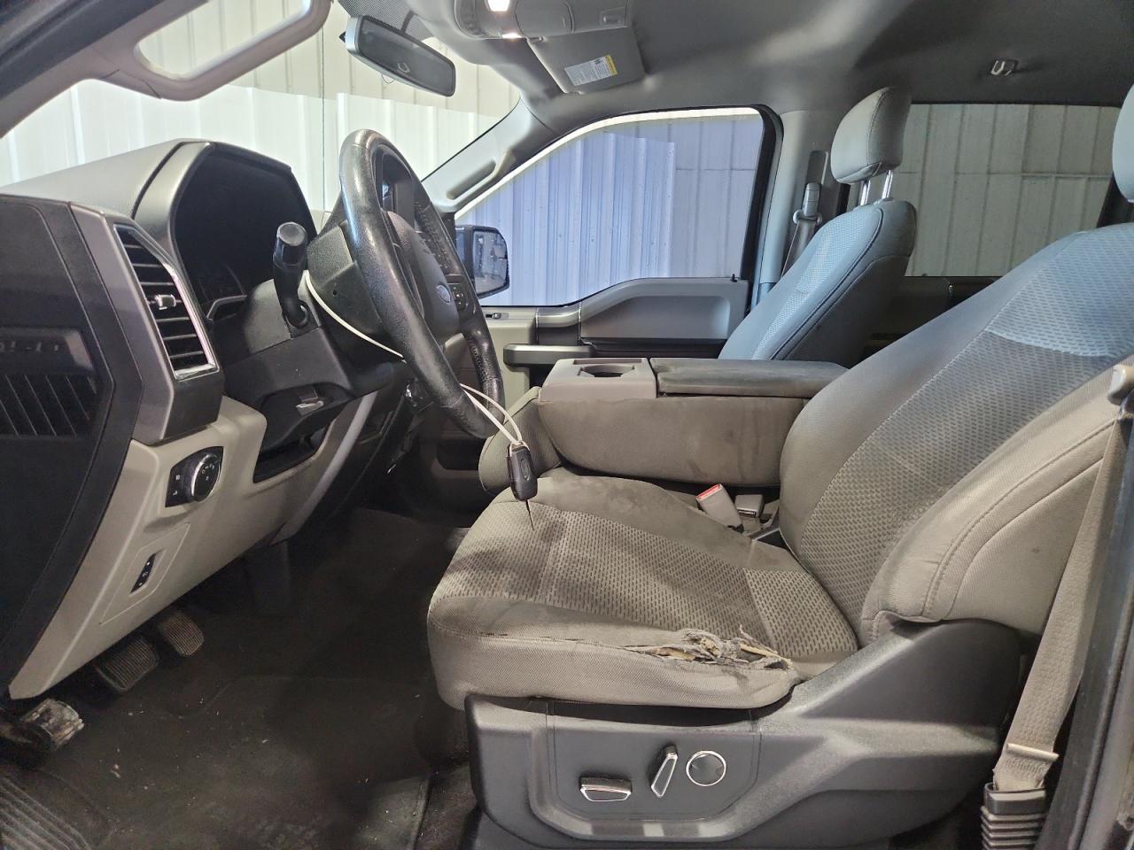 2015 Ford F150 Supercrew Black vin: 1FTEW1EF8FKE73021 Damage: Left Front Seat Cushion, Torn, 6 To 7 Inches