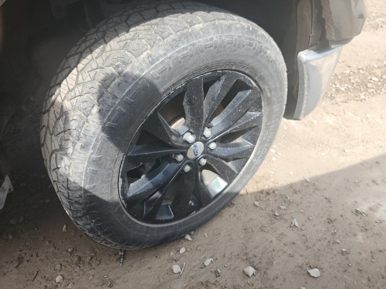 2015 Ford F150 Supercrew Black vin: 1FTEW1EP8FKD38999 Damage: Right Front Wheel, Curb Rash, > 12 Inches