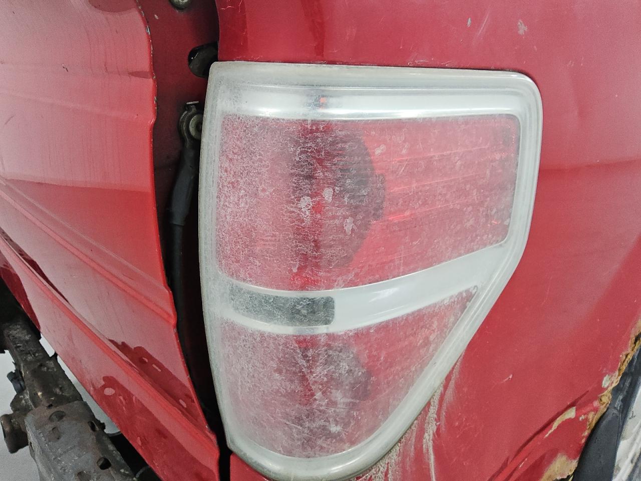 2010 Ford F150 Super Cab Red vin: 1FTEX1C80AKE32988 Damage: Right Tail Light, Faded, Repair Required