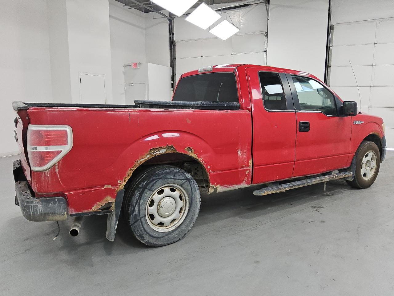 2010 Ford F150 Super Cab Red vin: 1FTEX1C80AKE32988 Damage: Spare Tire, Worn, Replacement Required
