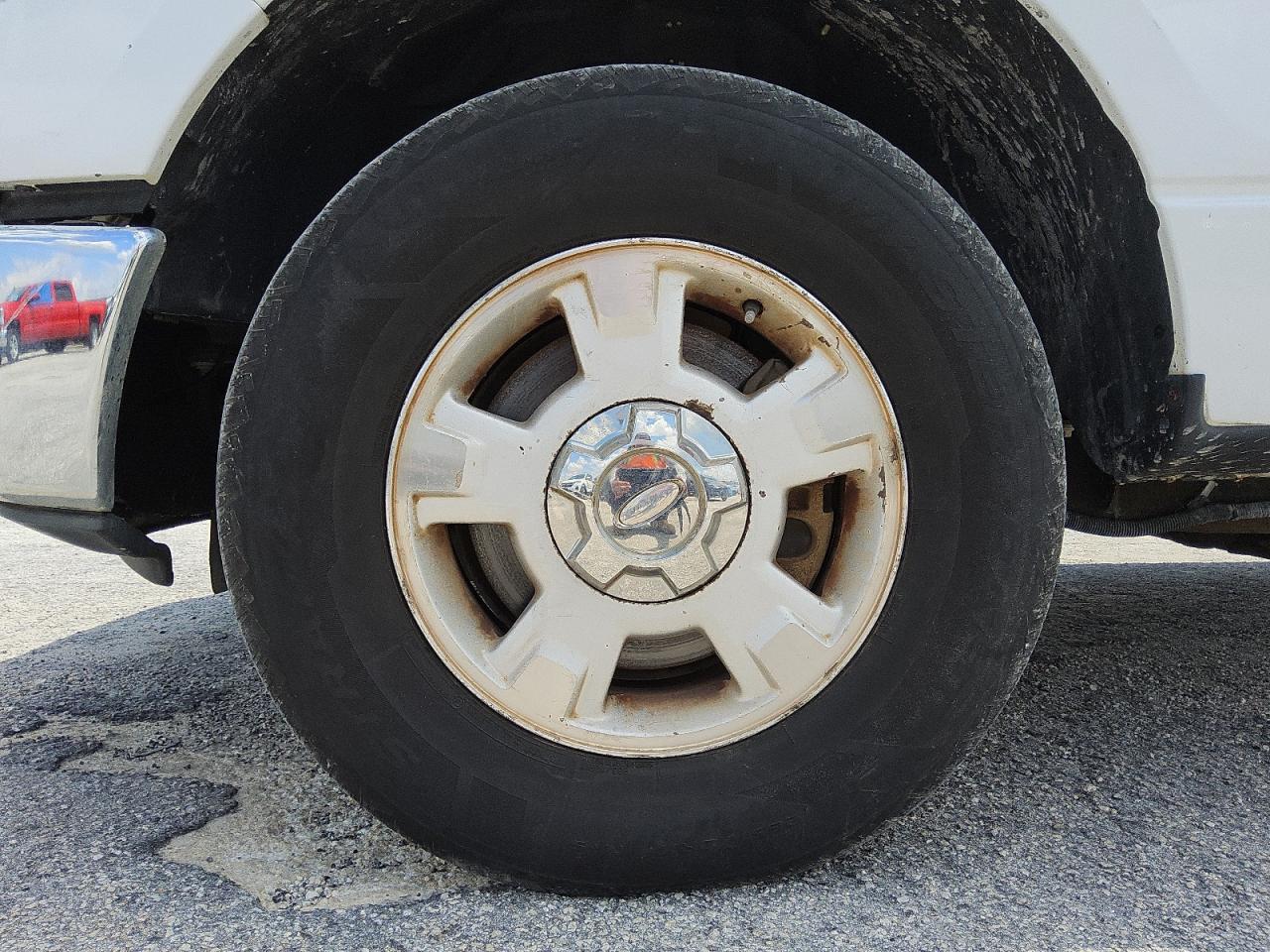 2010 Ford F150 Super Cab White vin: 1FTEX1C84AFD50965 Damage: Left Front Wheel, Curb Rash, 5 to 6 inches