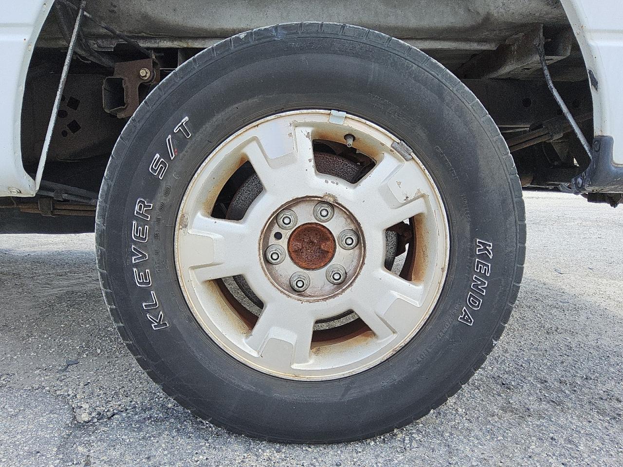 2010 Ford F150 Super Cab White vin: 1FTEX1C84AFD50965 Damage: Left Rear Wheel, Curb Rash, 6 to 7 inches