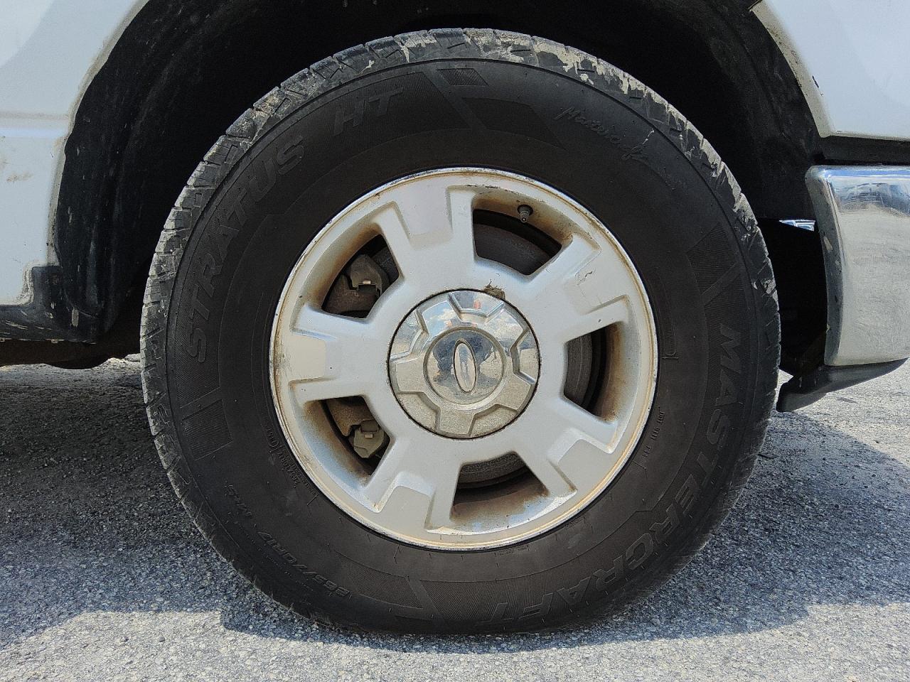 2010 Ford F150 Super Cab White vin: 1FTEX1C84AFD50965 Damage: Right Front Wheel, Curb Rash, 6 to 7 inches