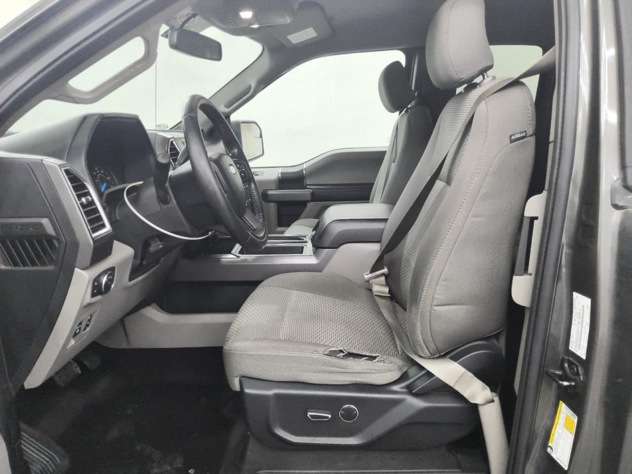 2015 Ford F150 Super Cab Gray vin: 1FTEX1C84FKF24189 Damage: Left Front Seat Cushion, Torn, 5 To 6 Inches