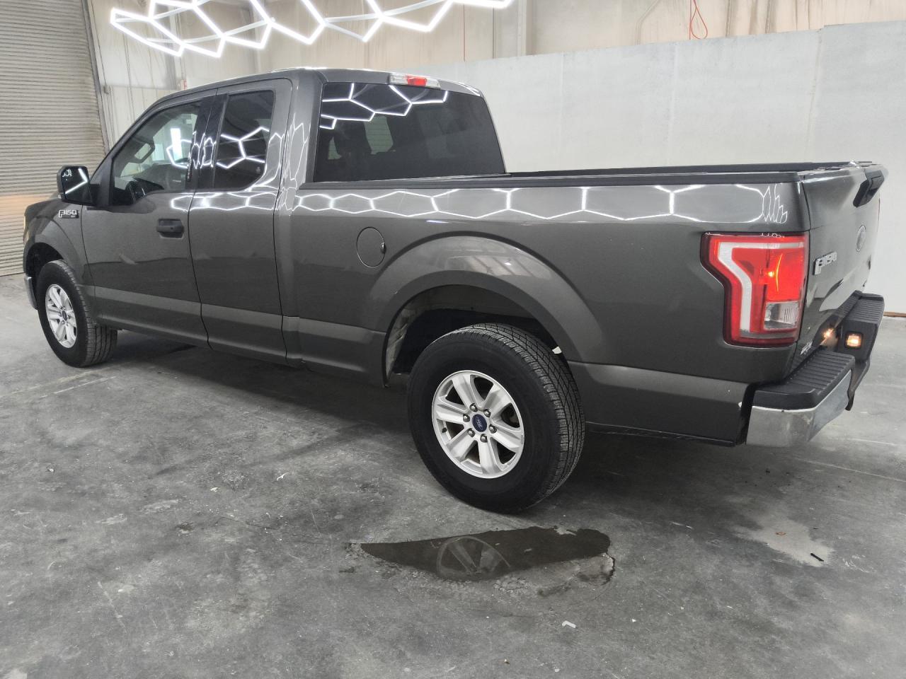 2015 Ford F150 Super Cab Gray vin: 1FTEX1C84FKF24189 Damage: Left Bed Side, Dent(S) W/ Paint Dmg, 1/8 To 1/2 Inch