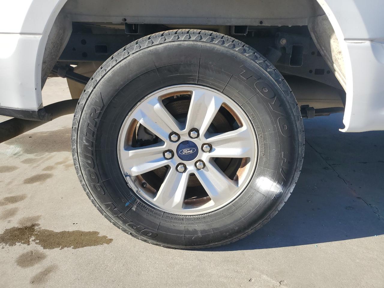 2015 Ford F150 Super Cab Blue vin: 1FTEX1C87FKD85188 Damage: Right Rear Wheel, Curb Rash, 3 To 4 Inches